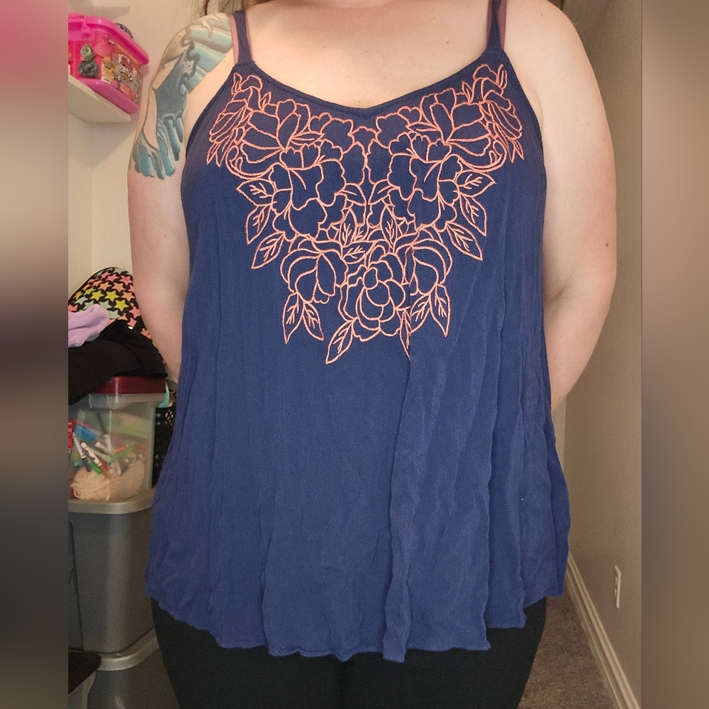 Blue Sleeveless Top with Orange Floral Design